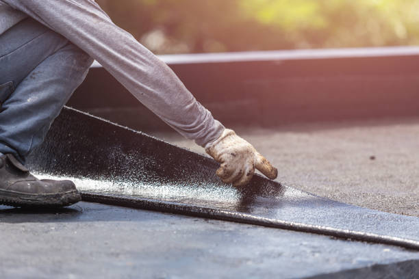 Professional Waterproofing technician working in Port Washington, WI